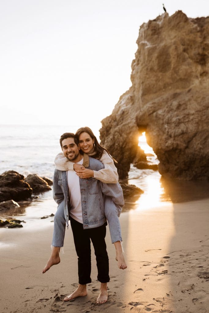 Happy Couple During Malibu Beach Engagement Session | Kelly O'Connor Photography | Austin Based Wedding Photographer | El Matador Beach | couples poses, couple smiling at each other, beach photos, casual beach photos, outfit ideas for engagement photos, outfit ideas for beach | via kellyoconnorphotography.com