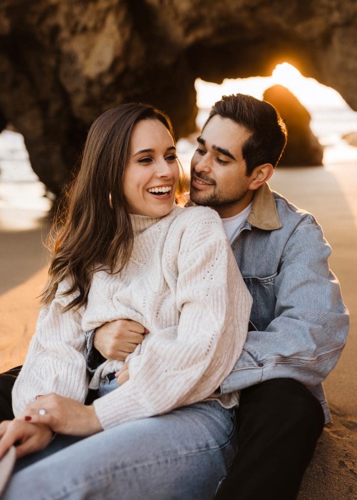 Happy Couple During Malibu Beach Engagement Session | Kelly O'Connor Photography | Austin Based Wedding Photographer | El Matador Beach | couples poses, couple smiling at each other, beach photos, casual beach photos, outfit ideas for engagement photos, outfit ideas for beach | via kellyoconnorphotography.com