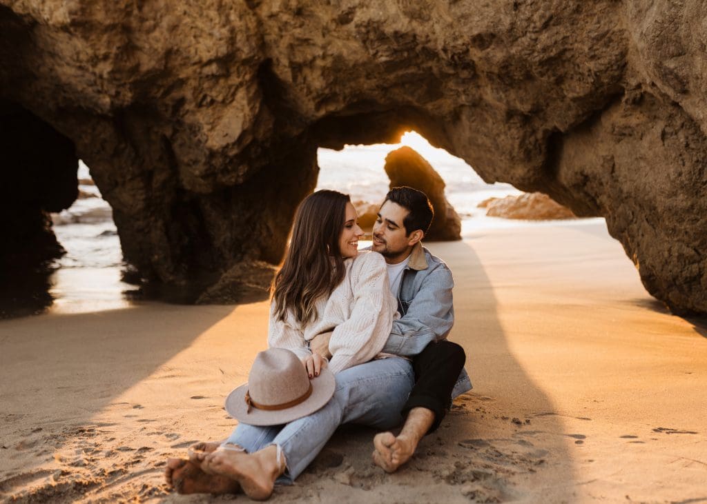 Happy Couple During Malibu Beach Engagement Session | Kelly O'Connor Photography | Austin Based Wedding Photographer | El Matador Beach | couples poses, couple smiling at each other, beach photos, casual beach photos, outfit ideas for engagement photos, outfit ideas for beach | via kellyoconnorphotography.com