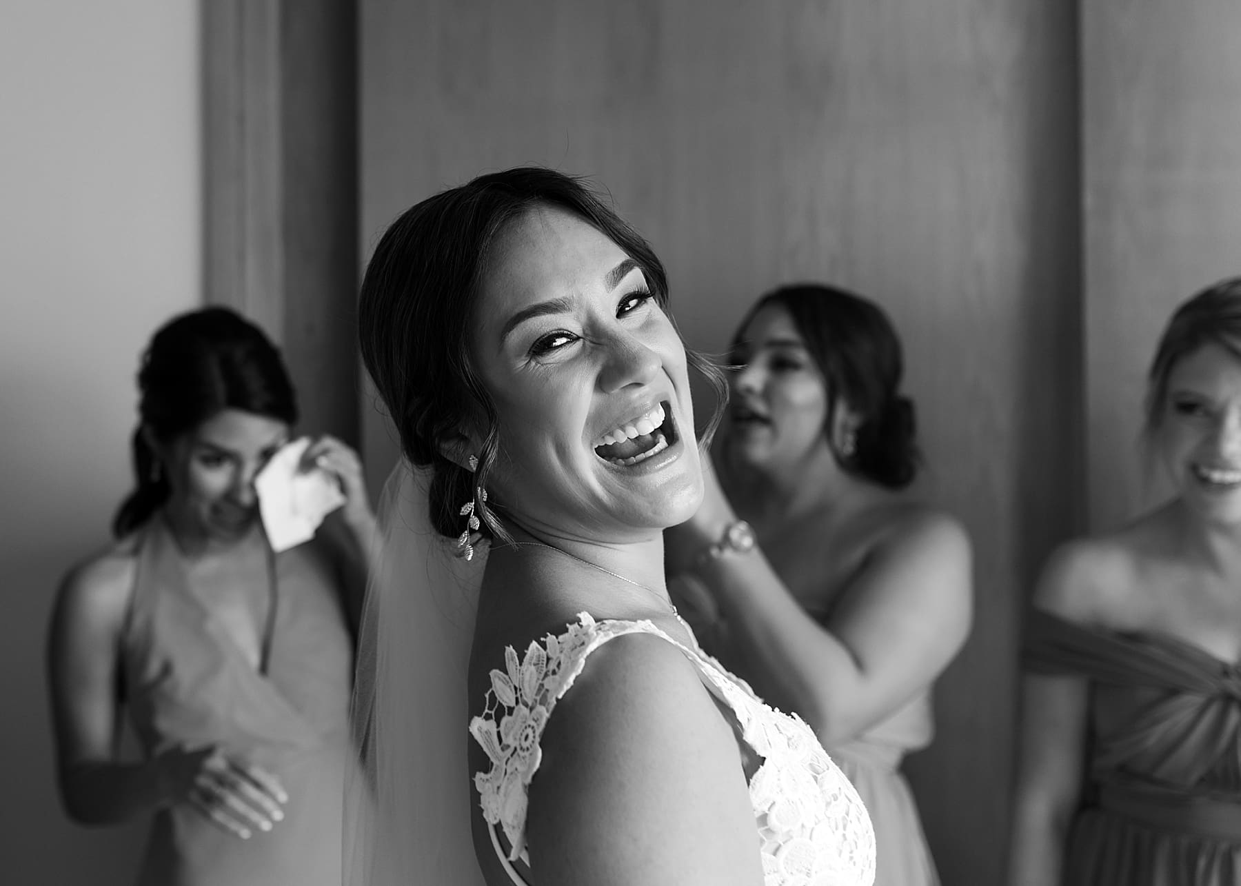 Bride smiling in black and white photo on wedding day | Beach Wedding at Dreams Playa Mujeres in Cancun | Kelly O'Connor Photography | Destination Wedding Photographer | wedding photography, beach wedding, Mexico destination wedding | via kellyoconnorphotography.com