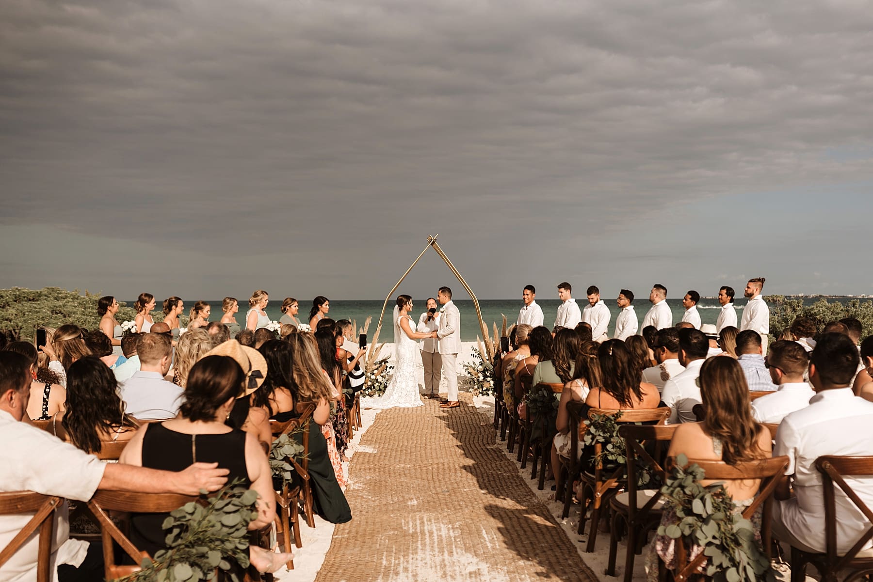 Bride and groom exchanging vows during beach wedding ceremony | Kelly O'Connor Photography | Destination Wedding Photographer | Dreams Playa Mujeres Wedding | wedding photography, beach wedding, Mexico destination wedding | via kellyoconnorphotography.com