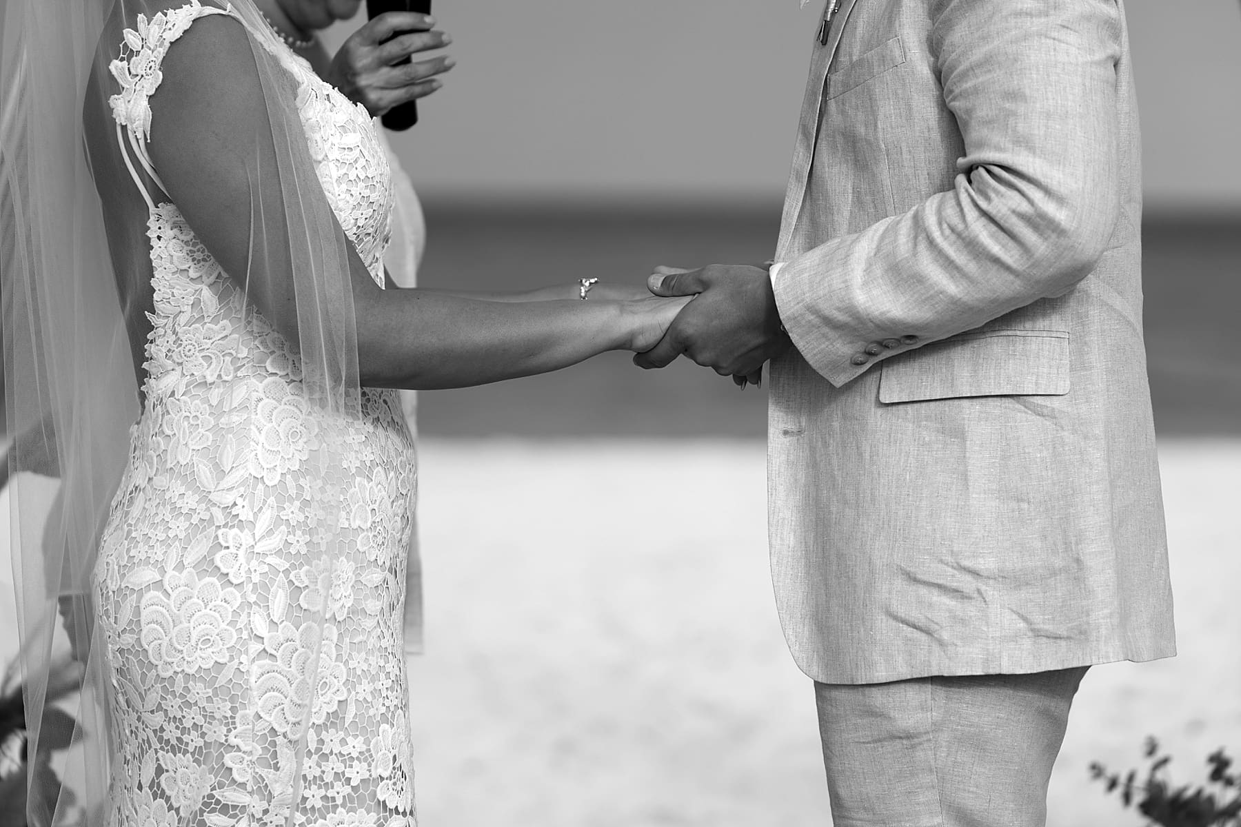 Black and white ceremony photo on beach | Kelly O'Connor Photography | Destination Wedding Photographer | Dreams Playa Mujeres Wedding | wedding photography, beach wedding, Mexico destination wedding | via kellyoconnorphotography.com