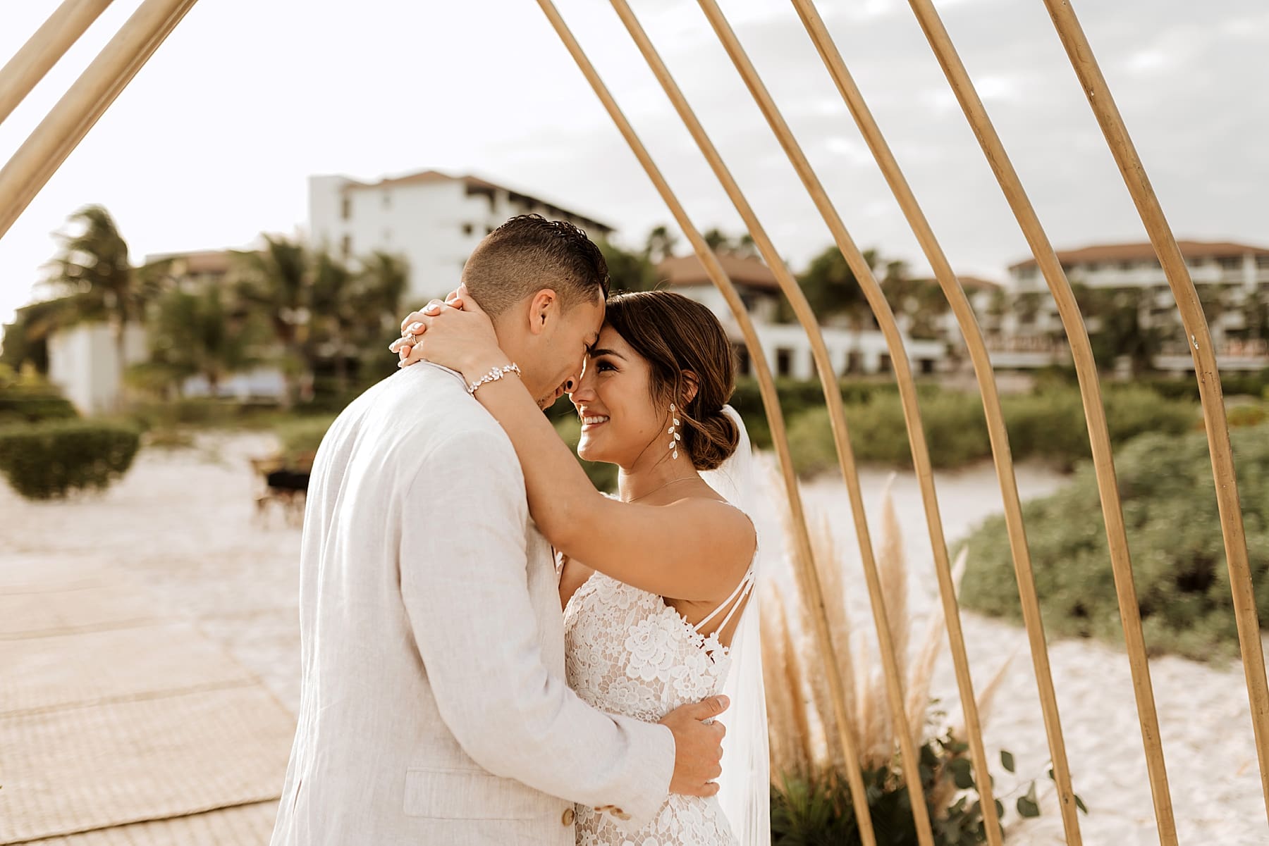Couple smiling at each other during beach wedding portraits | Kelly O'Connor Photography | Destination Wedding Photographer | Dreams Playa Mujeres Wedding | wedding photography, beach wedding, Mexico destination wedding | via kellyoconnorphotography.com