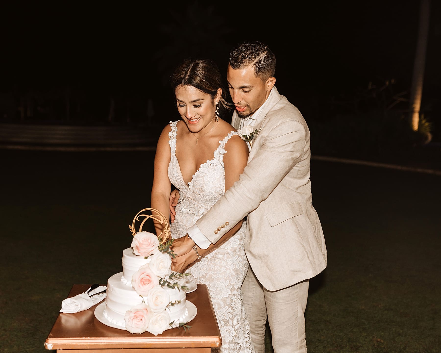 Outdoor wedding reception under draped lights in Mexico | Kelly O'Connor Photography | Destination Wedding Photographer | Dreams Playa Mujeres Wedding | first dance, reception photos, guests dancing | via kellyoconnorphotography.com