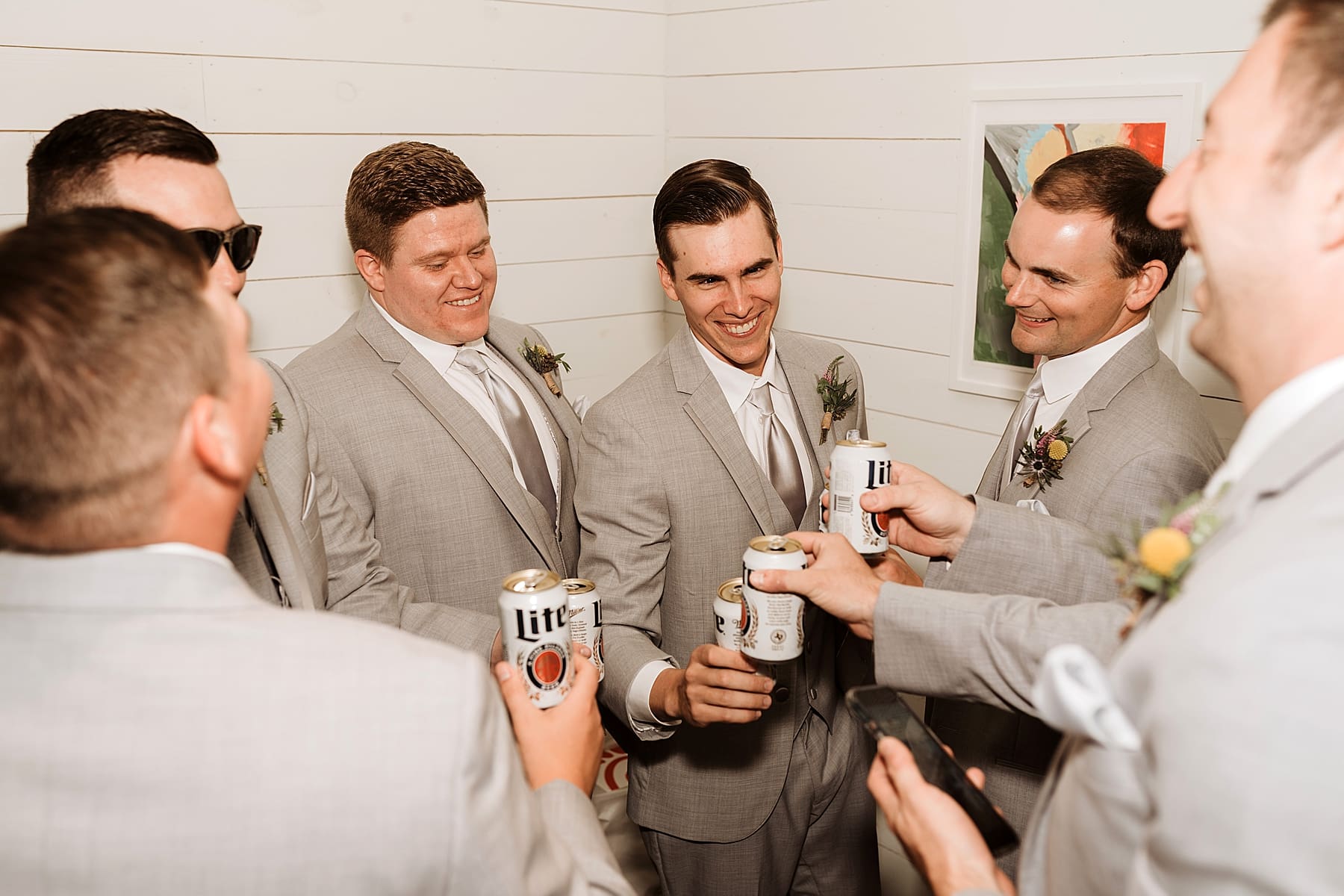 Groomsmen getting ready on wedding day | Kelly O'Connor Photography | Austin Wedding Photographer | Prospect House Wedding Day | edgy wedding ideas, groom and groomsmen fun socks, outfit attire for groomsmen, groom in suite | via kellyoconnorphotography.com