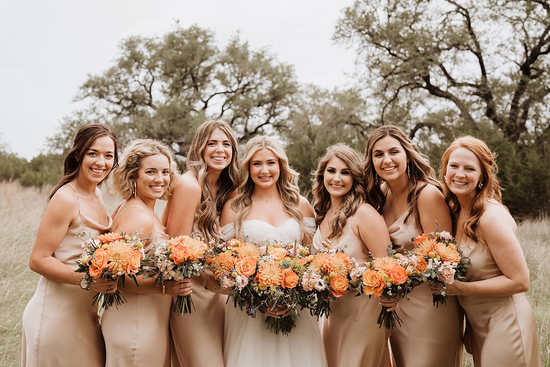 Bride getting ready with bridesmaids on wedding day | Kelly O'Connor Photography | Austin Wedding Photographer | Prospect House Wedding Day | edgy wedding ideas, bride putting on lipstick, bride in converse | via kellyoconnorphotography.com