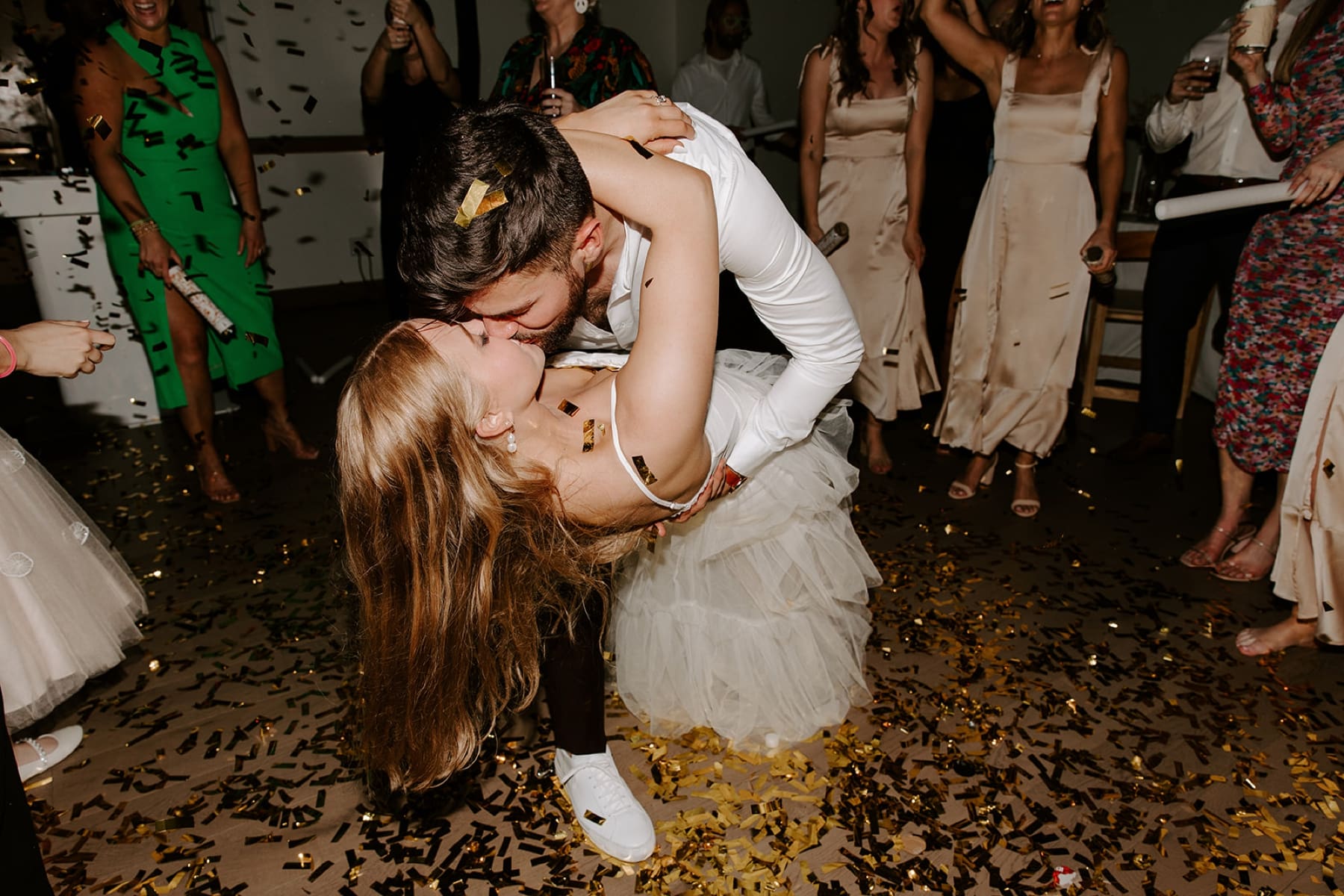 Outdoor wedding reception under twinkle lights in Hotel Magdelena courtyard in Austin, Texas. | Kelly O'Connor Photography