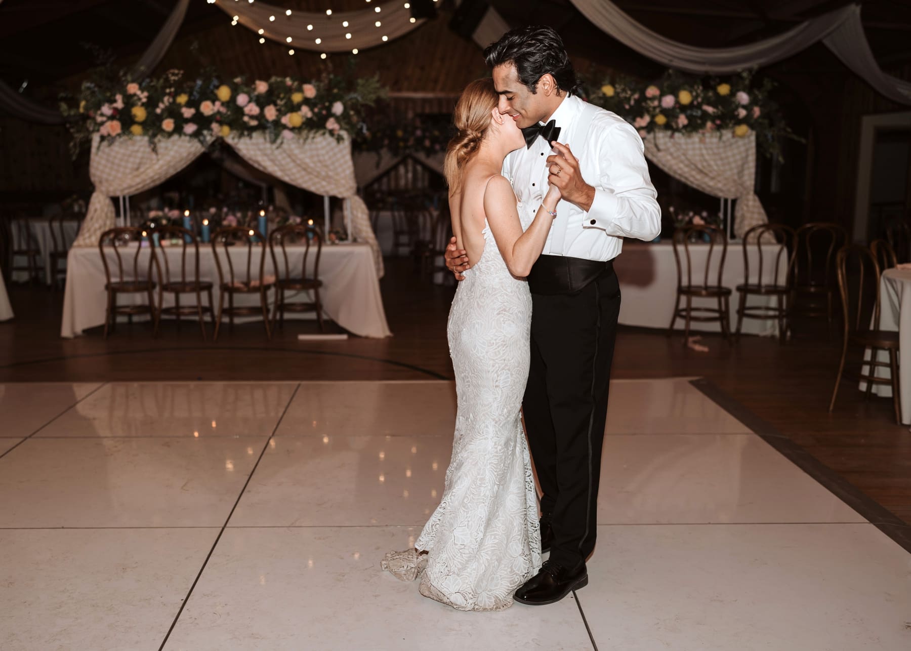 Bride and groom having final private dance at end of destination Colorado wedding 