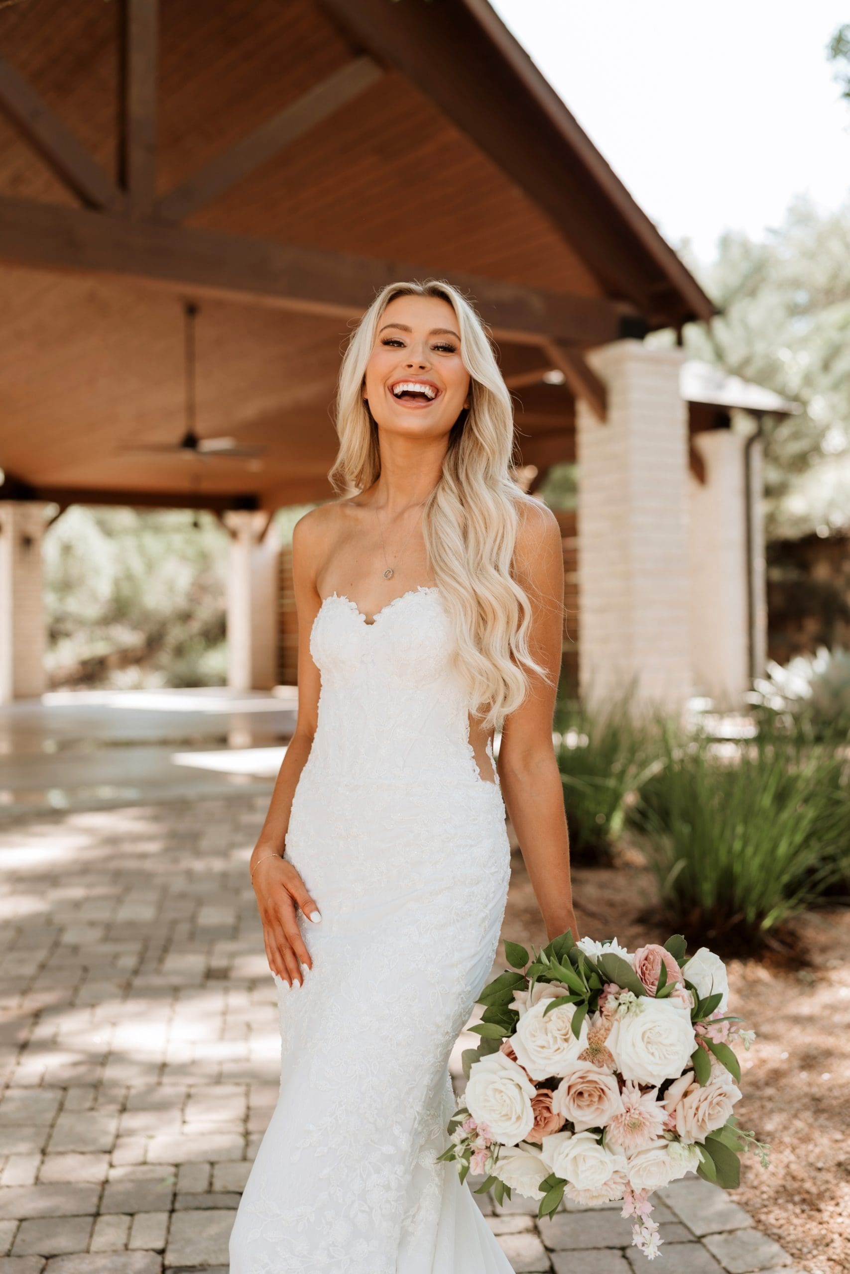 Bride laughing during bridal portraits at Hayes Hollow at Hidden Falls