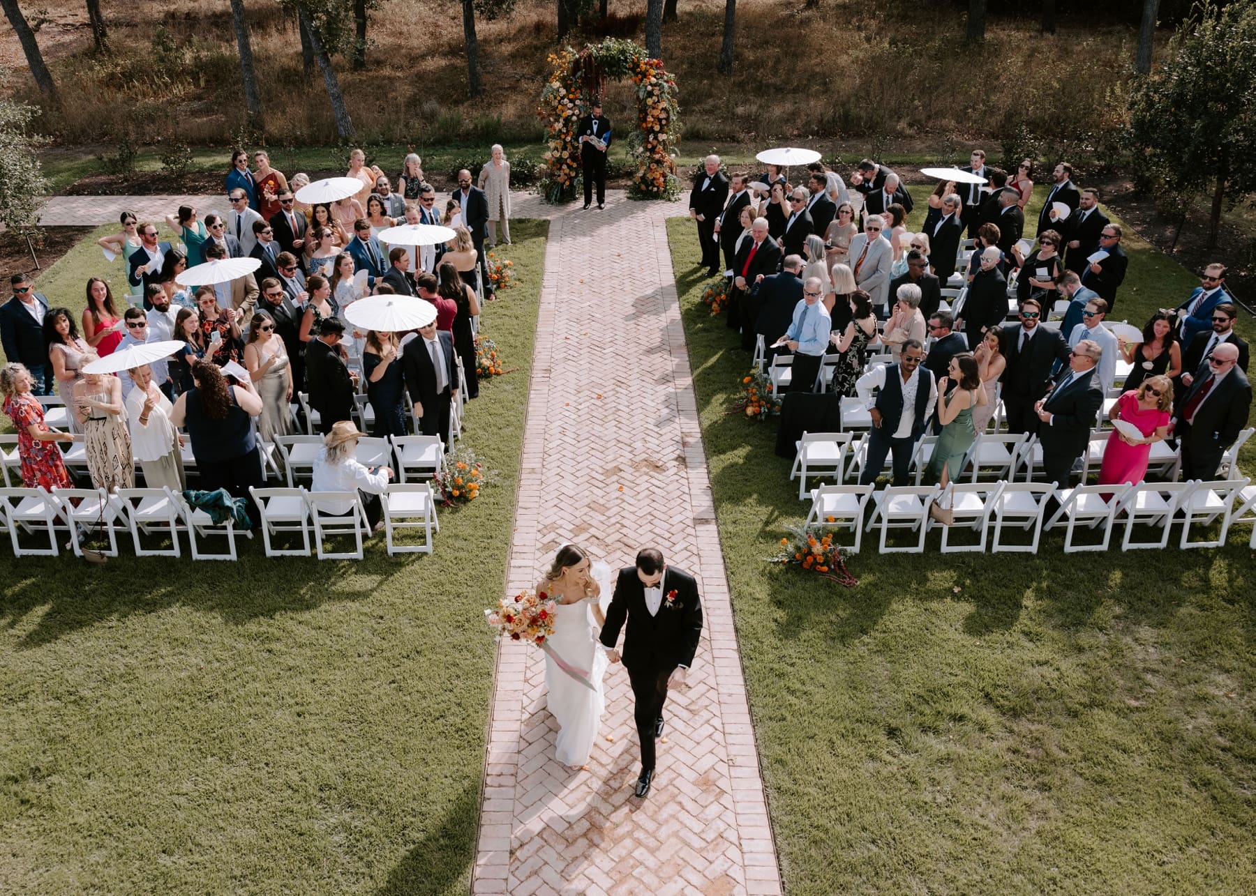 Overhead view of bride and groom exiting ceremony at The Grand Lady Austin
