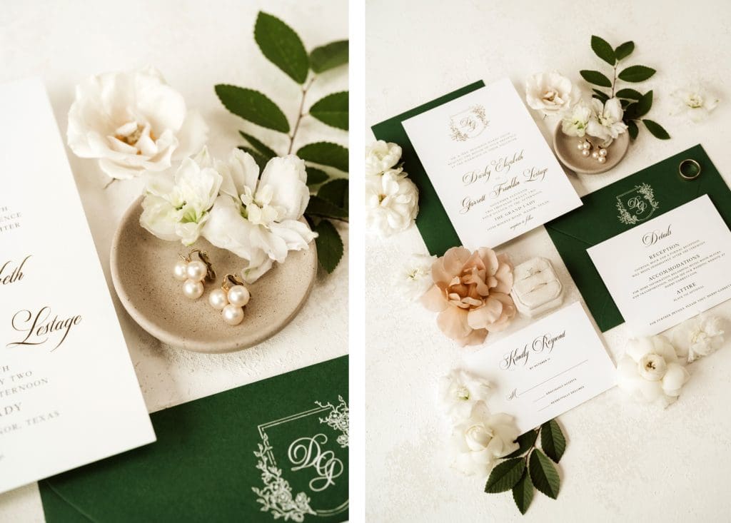 Flat lay featuring white invitation with dark green envelope and white and pink flowers